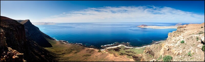Coastal Cliffs and Ocean — Blue, Serene, Afternoon, Photograph, Island