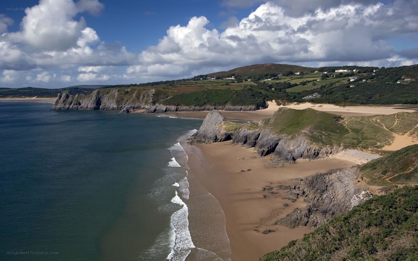 coastal cliffs and sandy beach