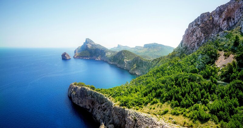 Coastal Cliffs and Sea — Blue, Serene, Afternoon, Photograph, Island