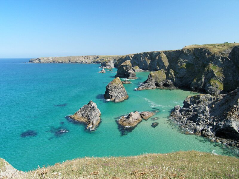 Coastal Cliffs and Sea — Blue, Serene, Afternoon, Photograph, Rocks, Ocean