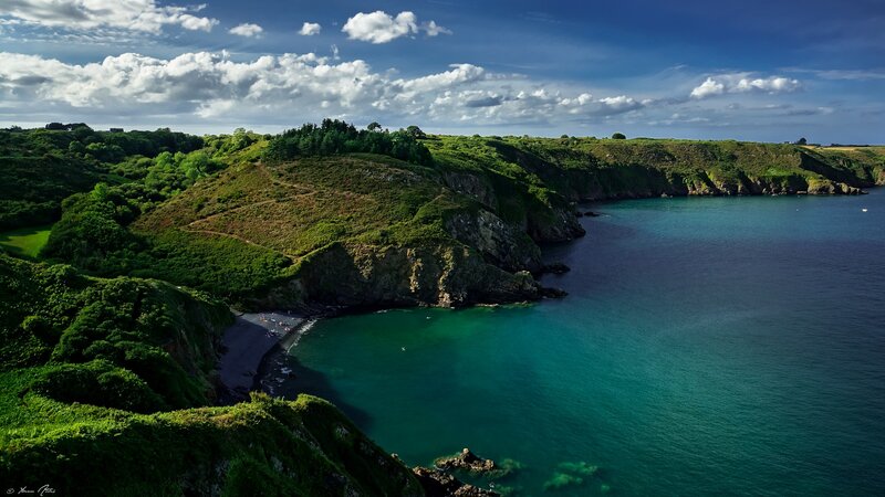 coastal cliffs and turquoise bay