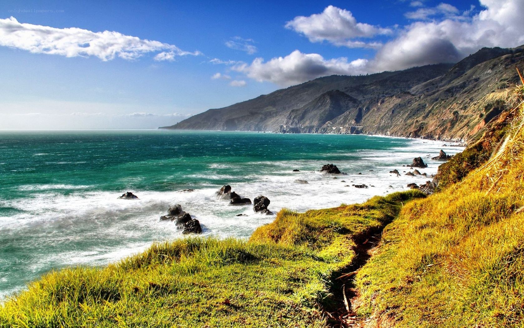 Coastal cliffs and turquoise sea