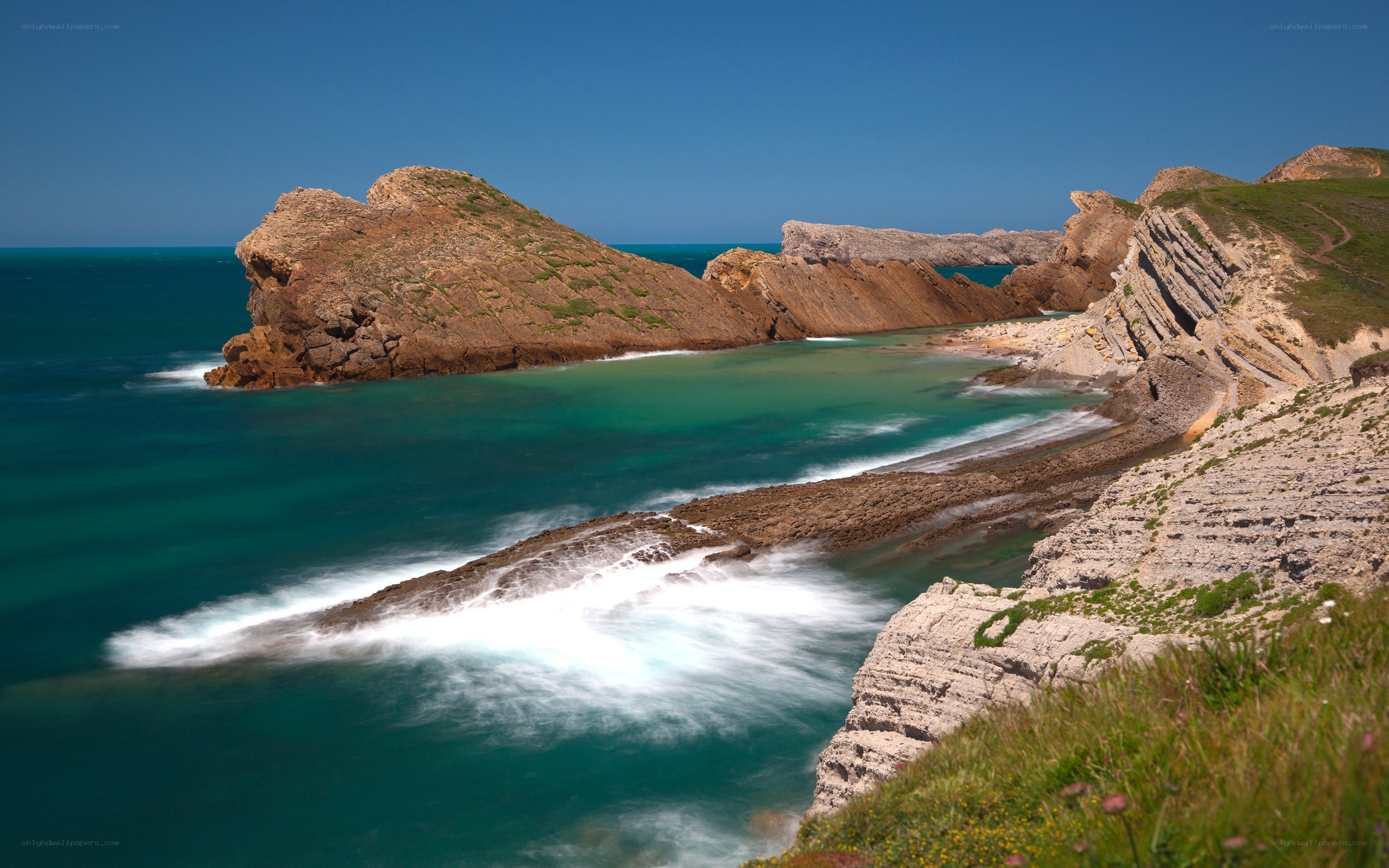 coastal cliffs and turquoise waters