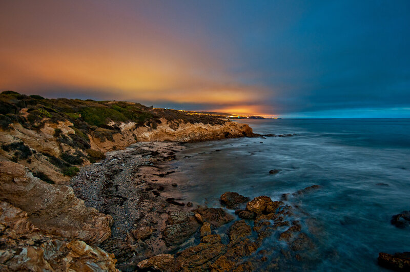 Coastal Cliffs at Dusk — Orange