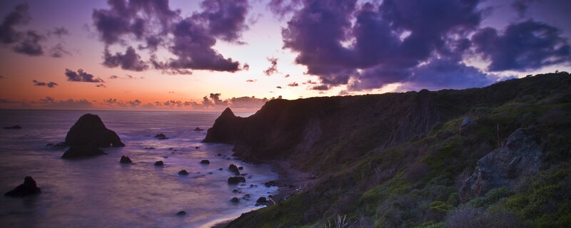 Coastal Cliffs at Sunset — Ocean