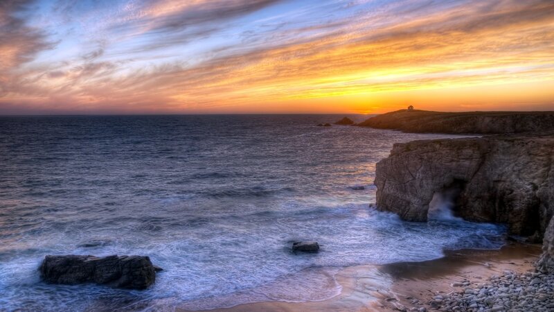 Coastal Cliffs at Sunset — Orange