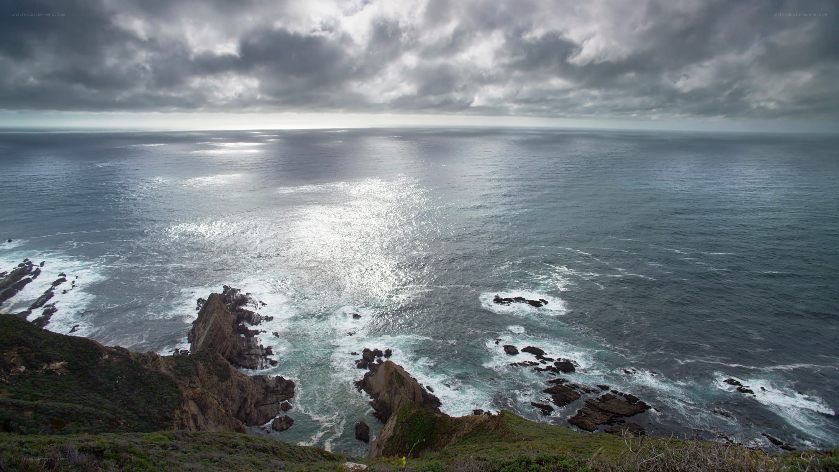 coastal cliffs under stormy sky