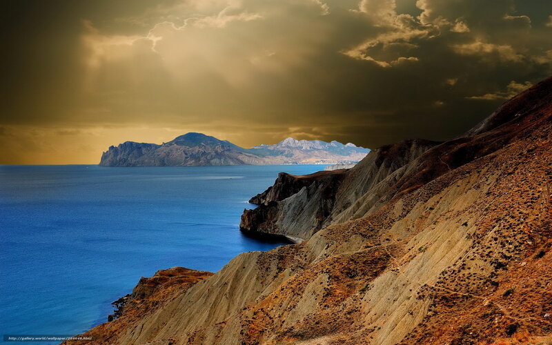 Coastal cliffs under stormy sky