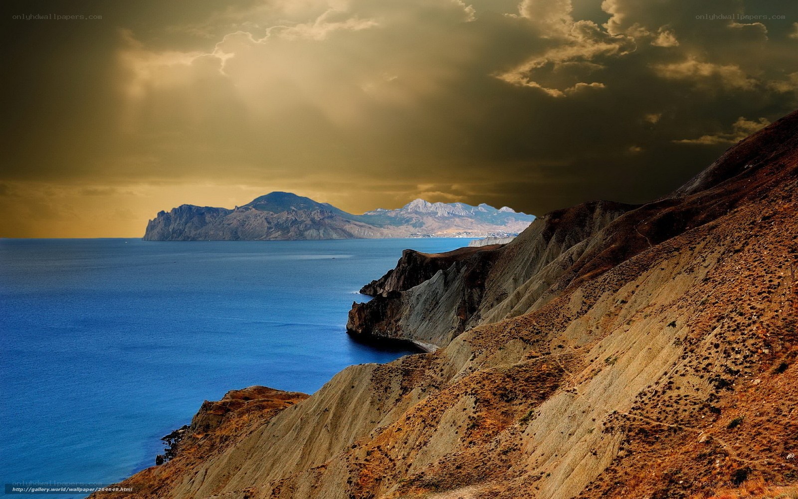 Coastal cliffs under stormy sky