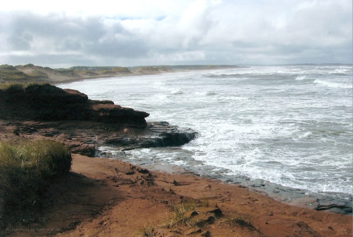 coastal cliffs with crashing waves