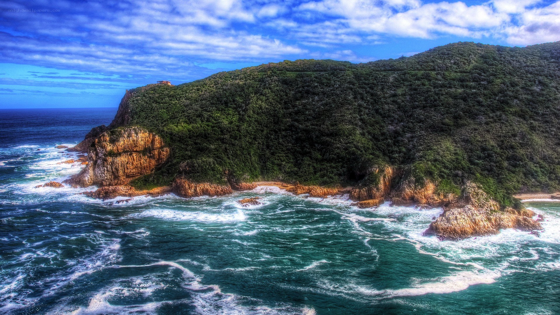 coastal cliffs with crashing waves