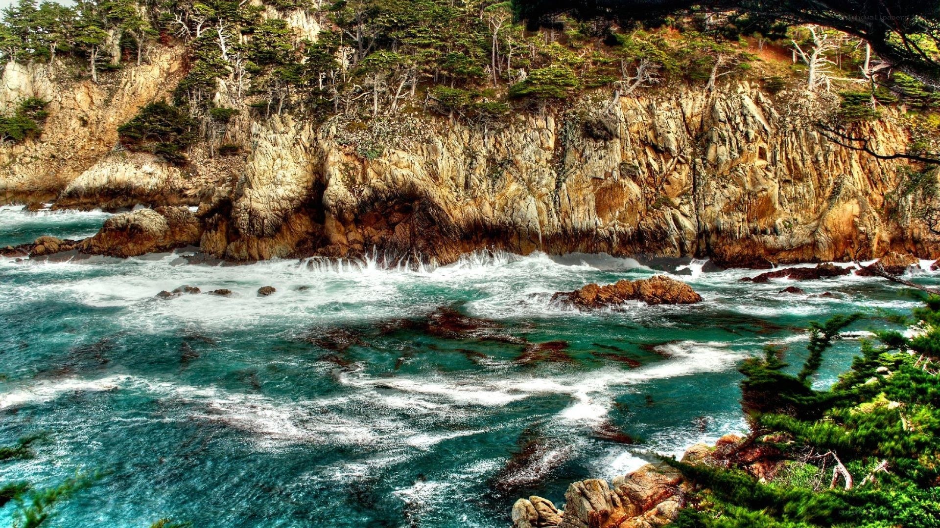 coastal cliffs with crashing waves