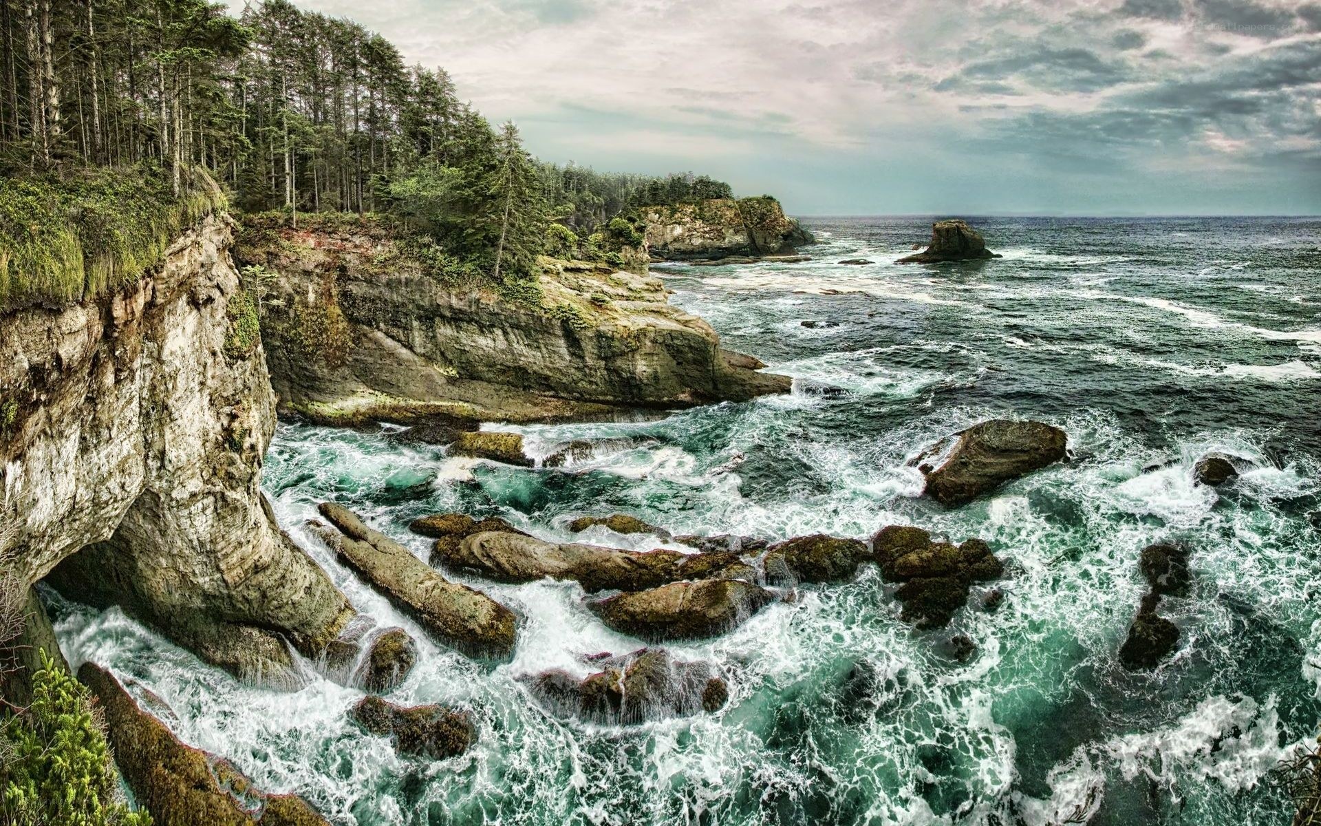 coastal cliffs with crashing waves