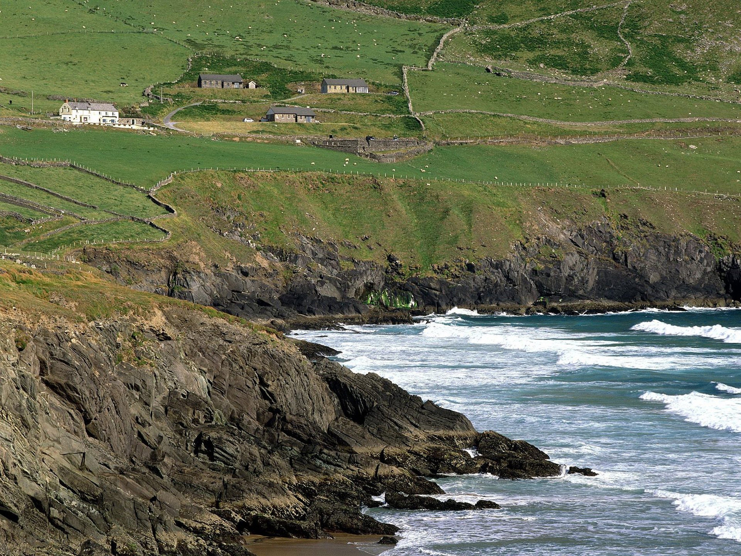 coastal cliffs with farmhouses
