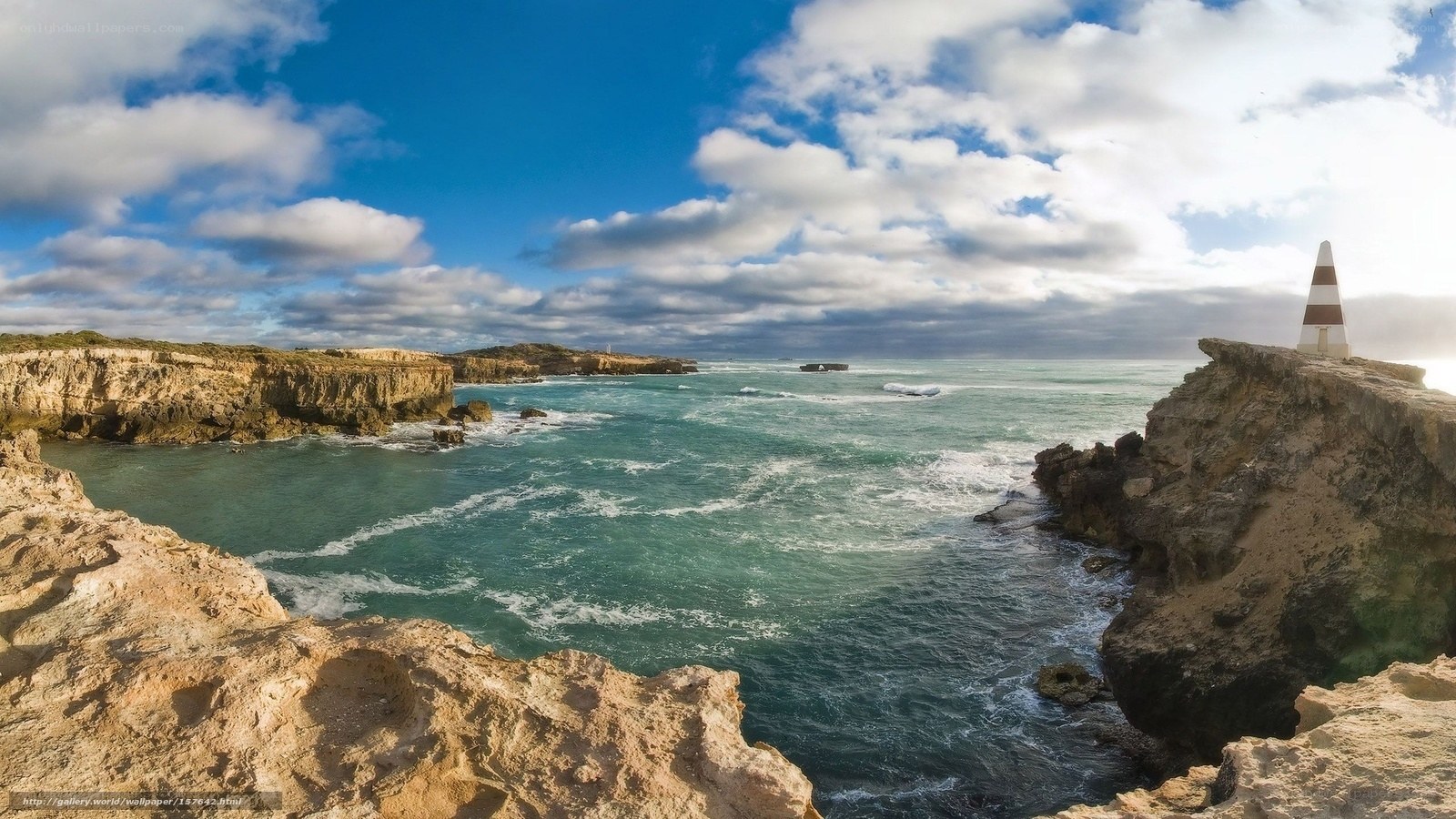 Coastal cliffs with lighthouse