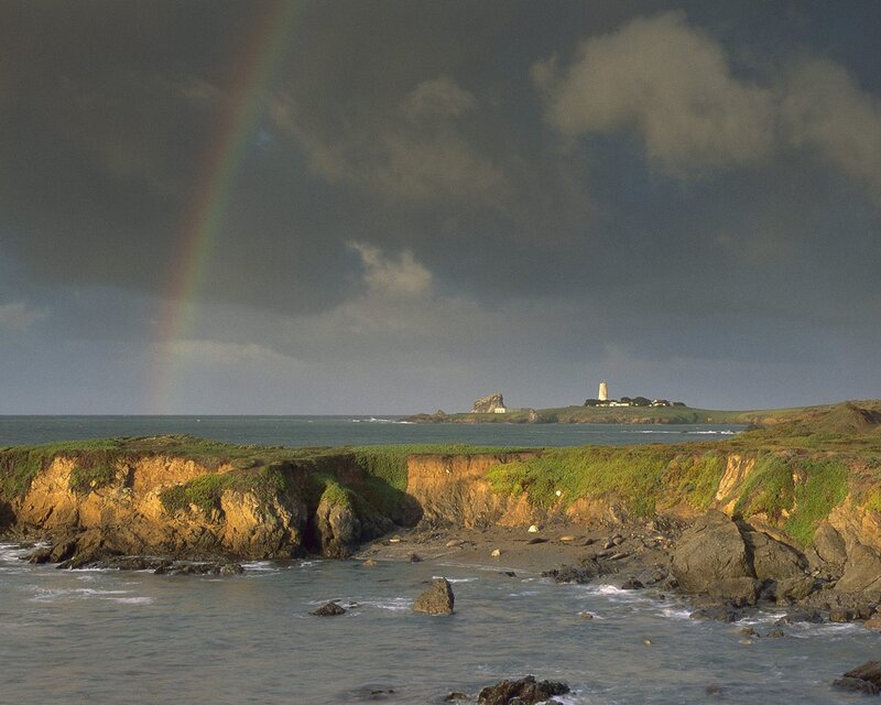 Coastal Cliffs with Rainbow