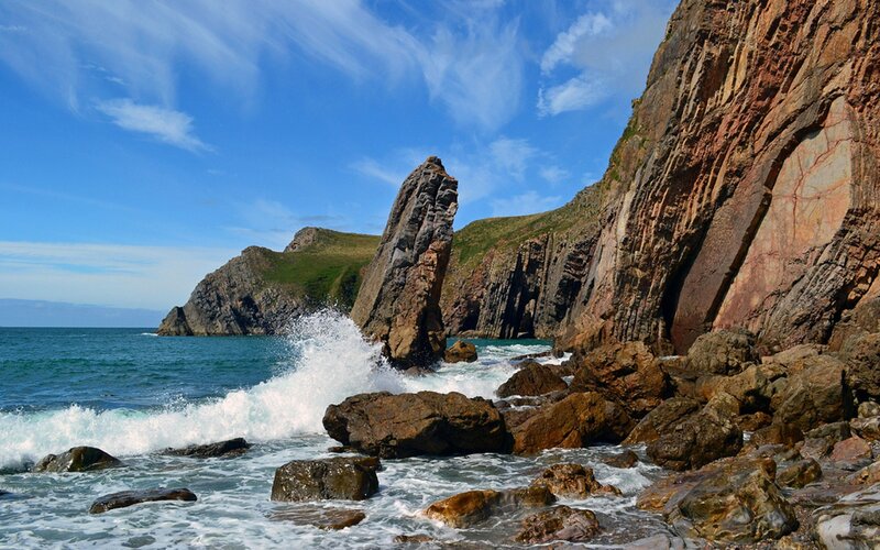 coastal cliffs with sea stacks