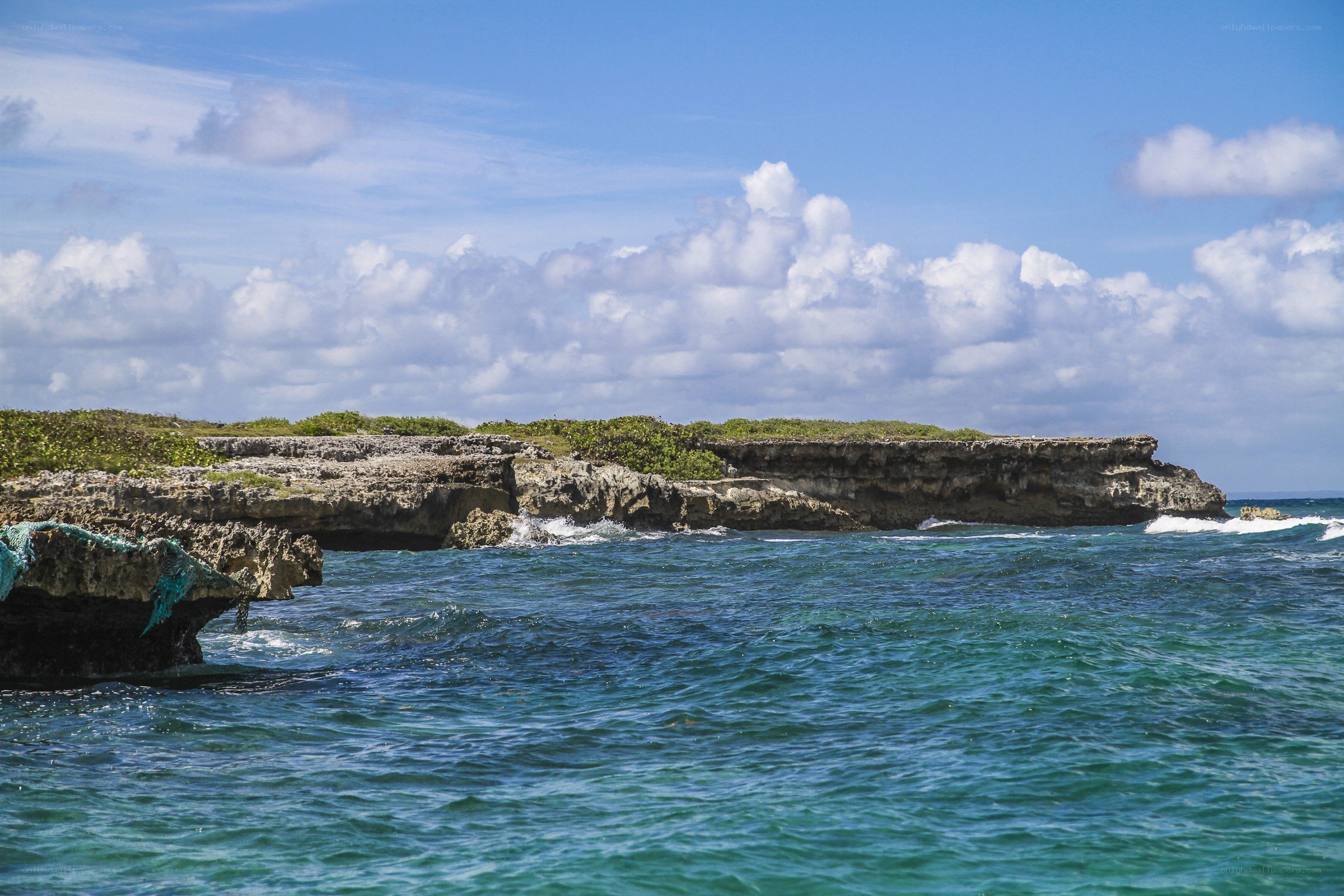 coastal cliffs with turquoise water