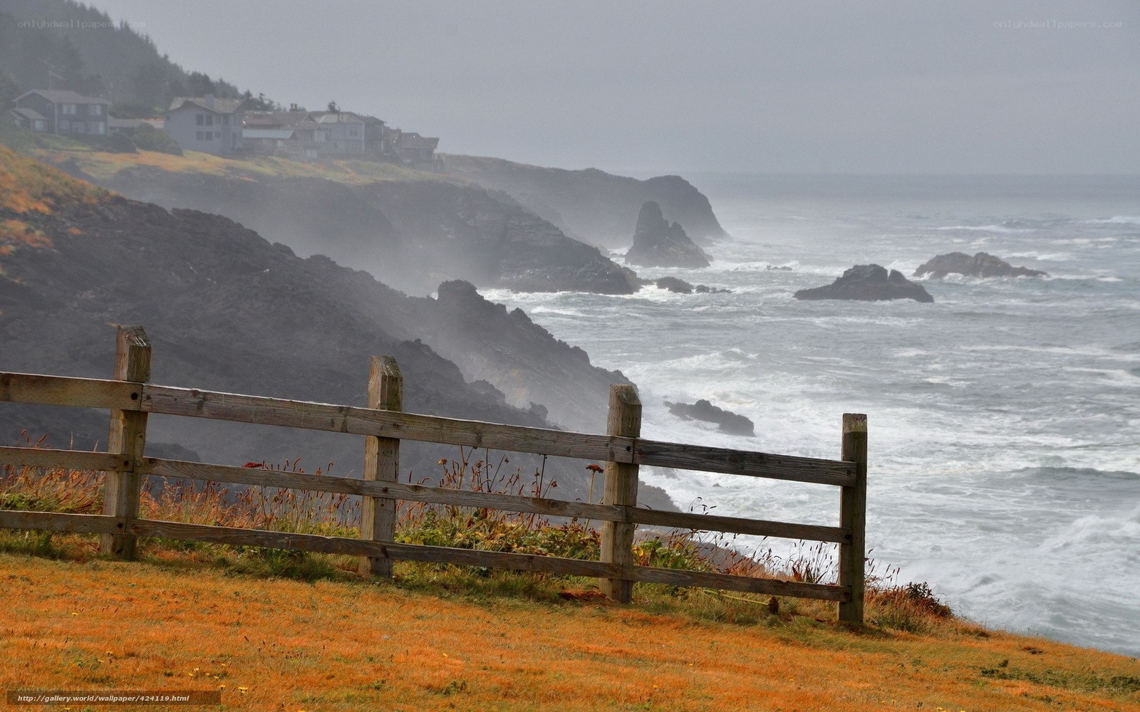 Coastal cliffs with wooden fence