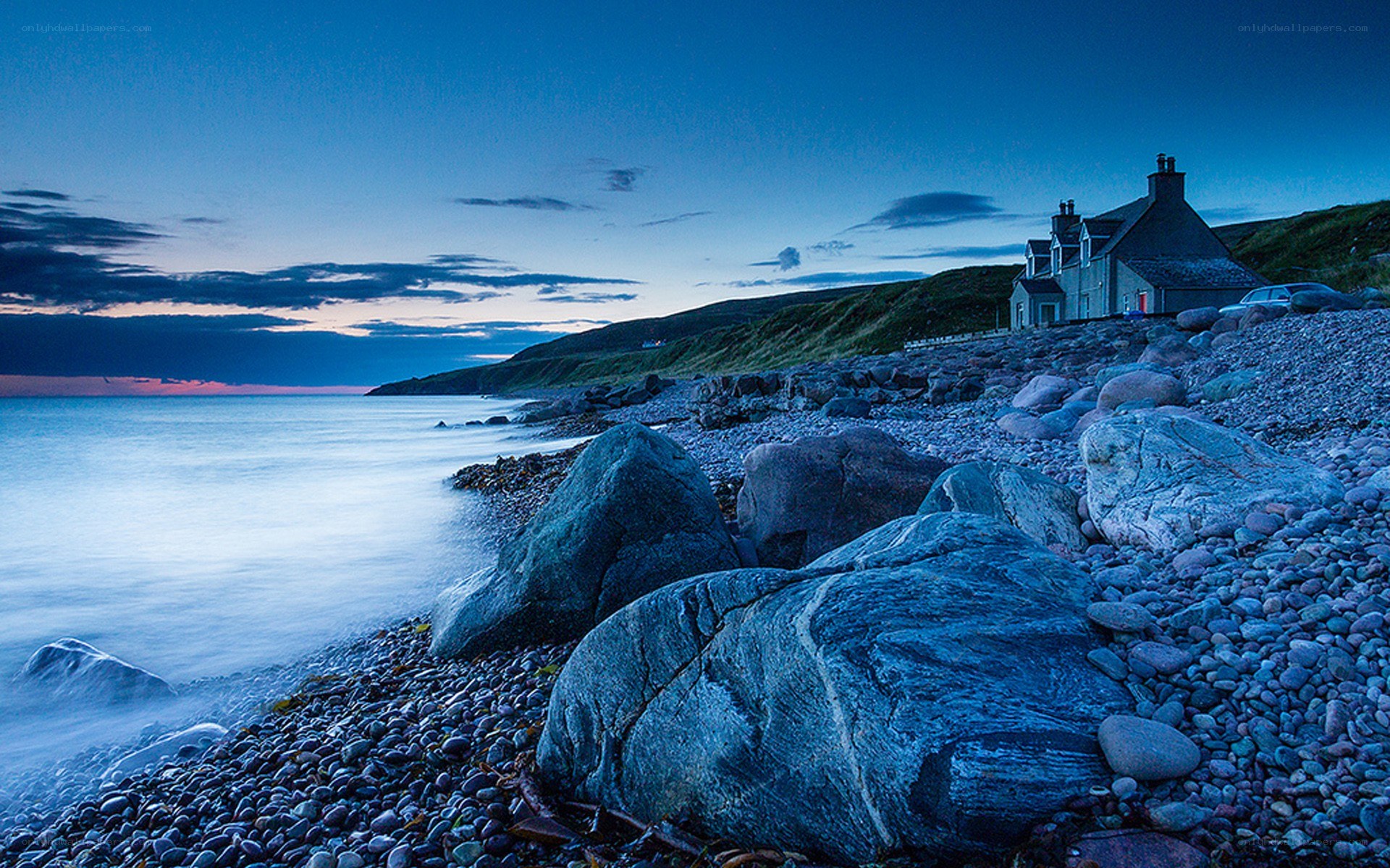 coastal cottage at dusk