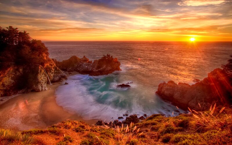 Coastal Cove at Sunset — Orange, Serene, Photograph, Ocean, Rocks