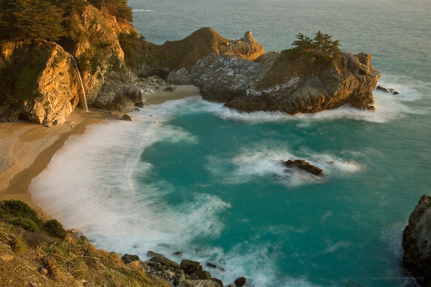 coastal cove with waterfall