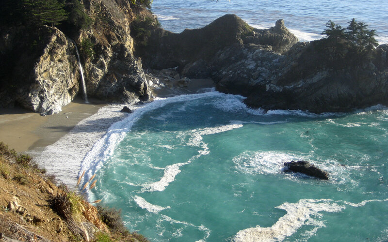 coastal cove with waterfall
