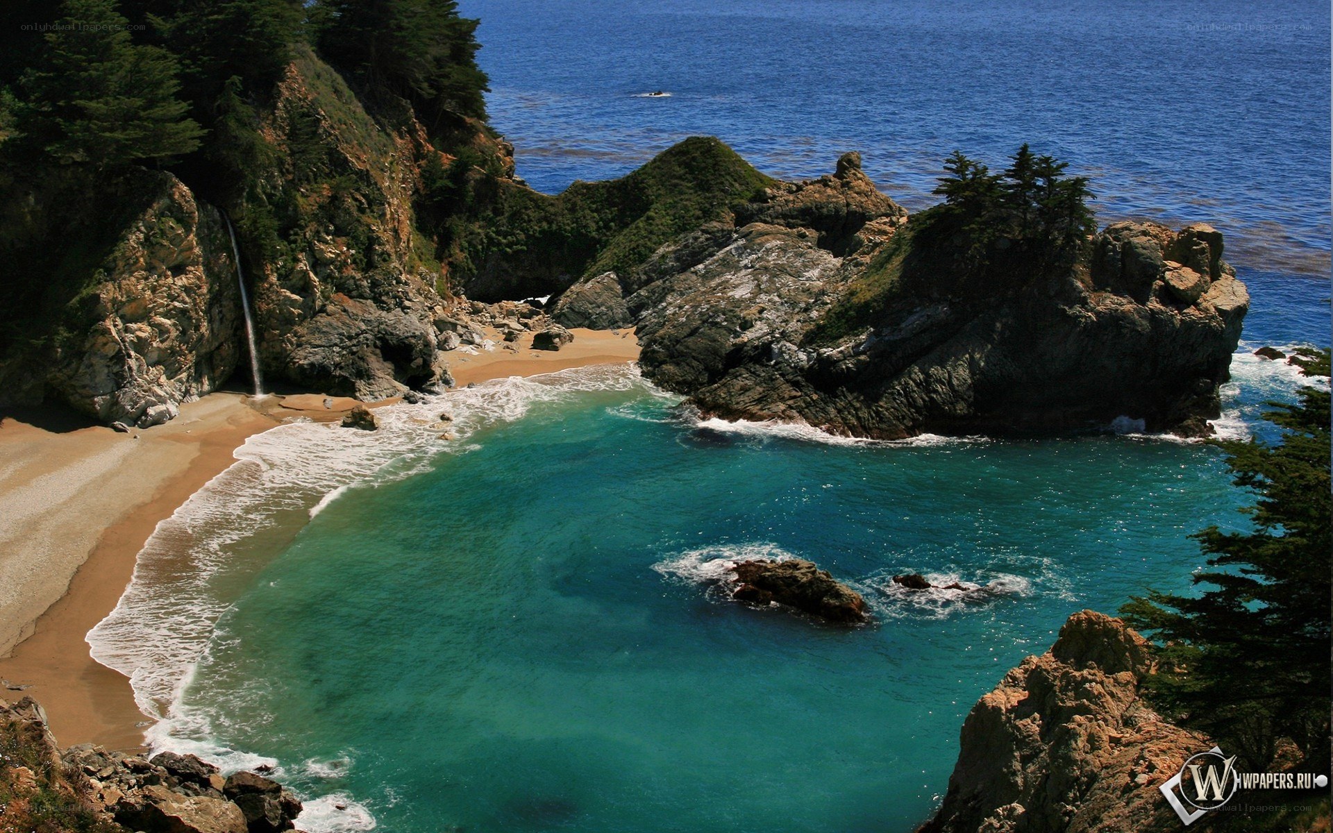 coastal cove with waterfall