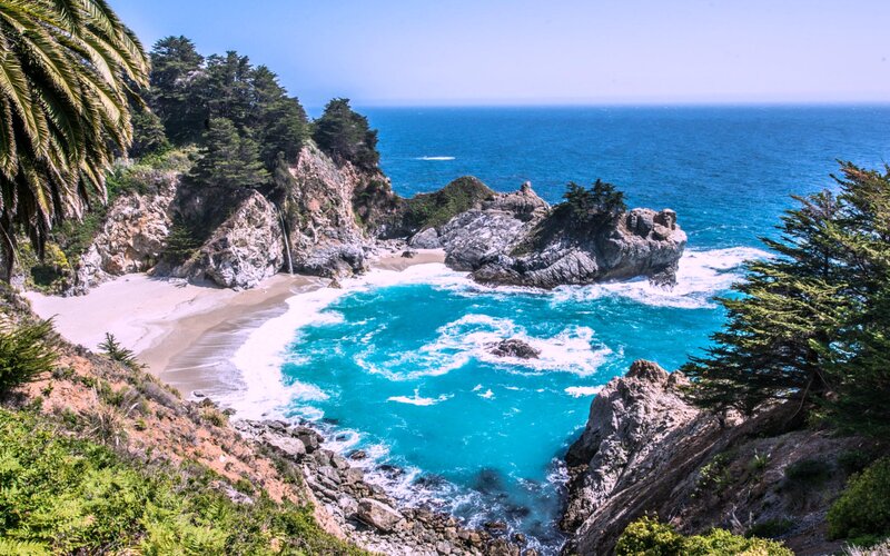 Coastal Cove with Waterfall — Blue, Serene, Afternoon, Photograph, Beach, Ocean