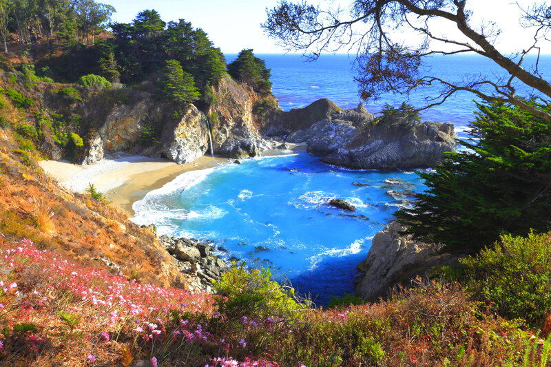 Coastal Cove with Waterfall — Blue, Serene, Afternoon, Photograph, Beach