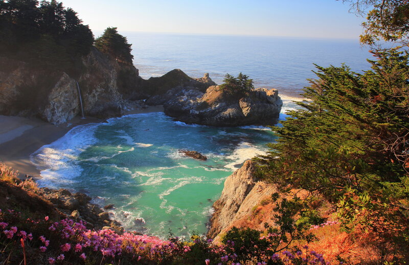 Coastal Cove with Waterfall — Blue, Serene, Afternoon, Photograph, Ocean