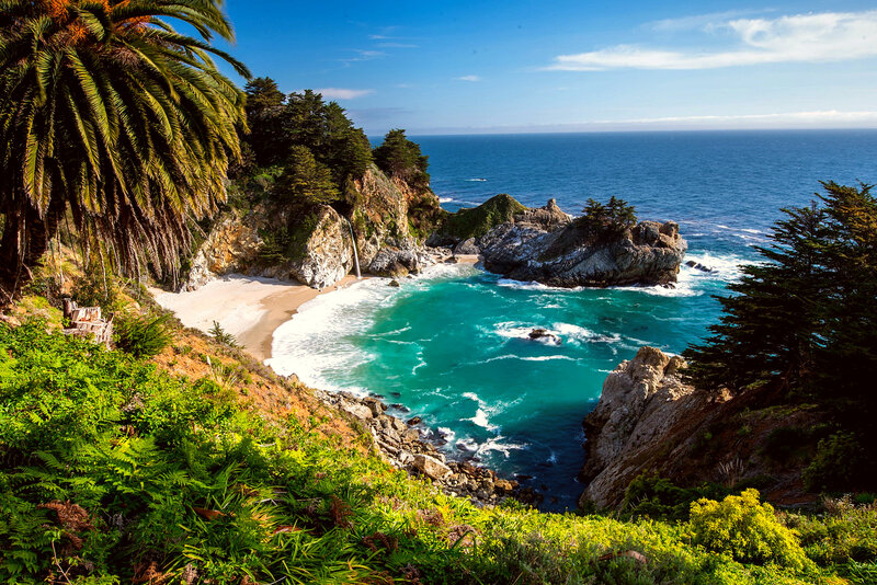 Coastal Cove with Waterfall — Blue, Serene, Afternoon, Photograph, Palm Tree, Beach