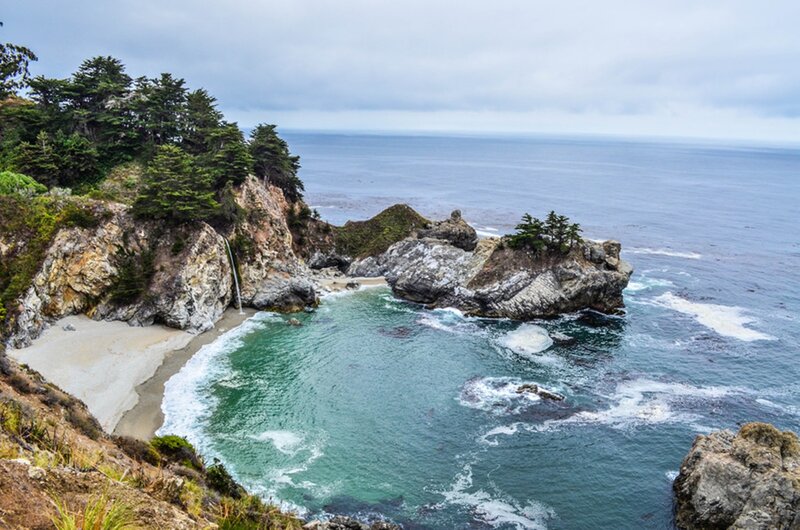 Coastal Cove with Waterfall — Blue, Serene, Photograph