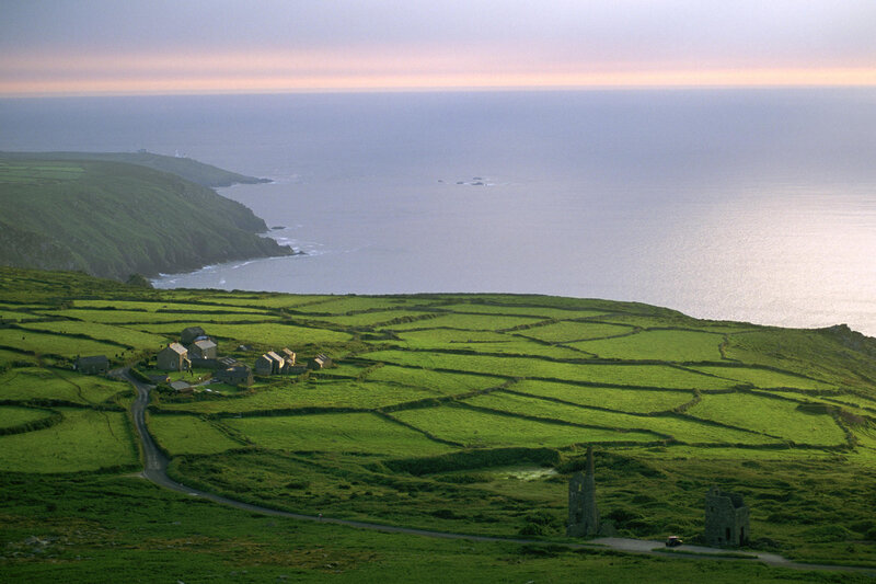Coastal fields and cliffs at sunset