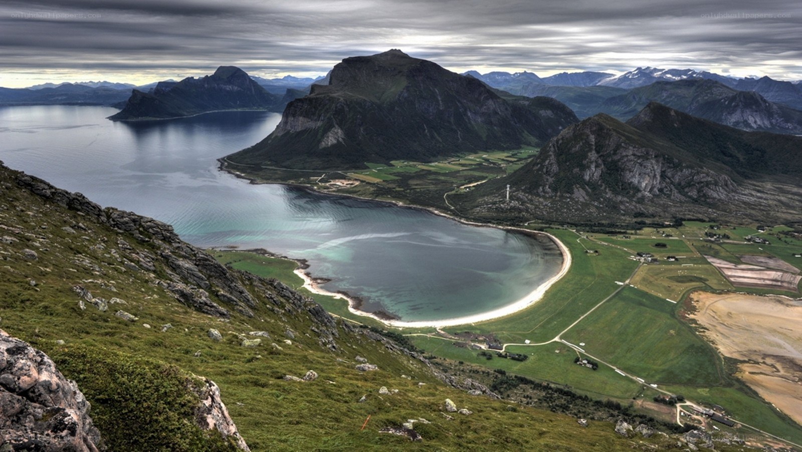 coastal fjord with mountains