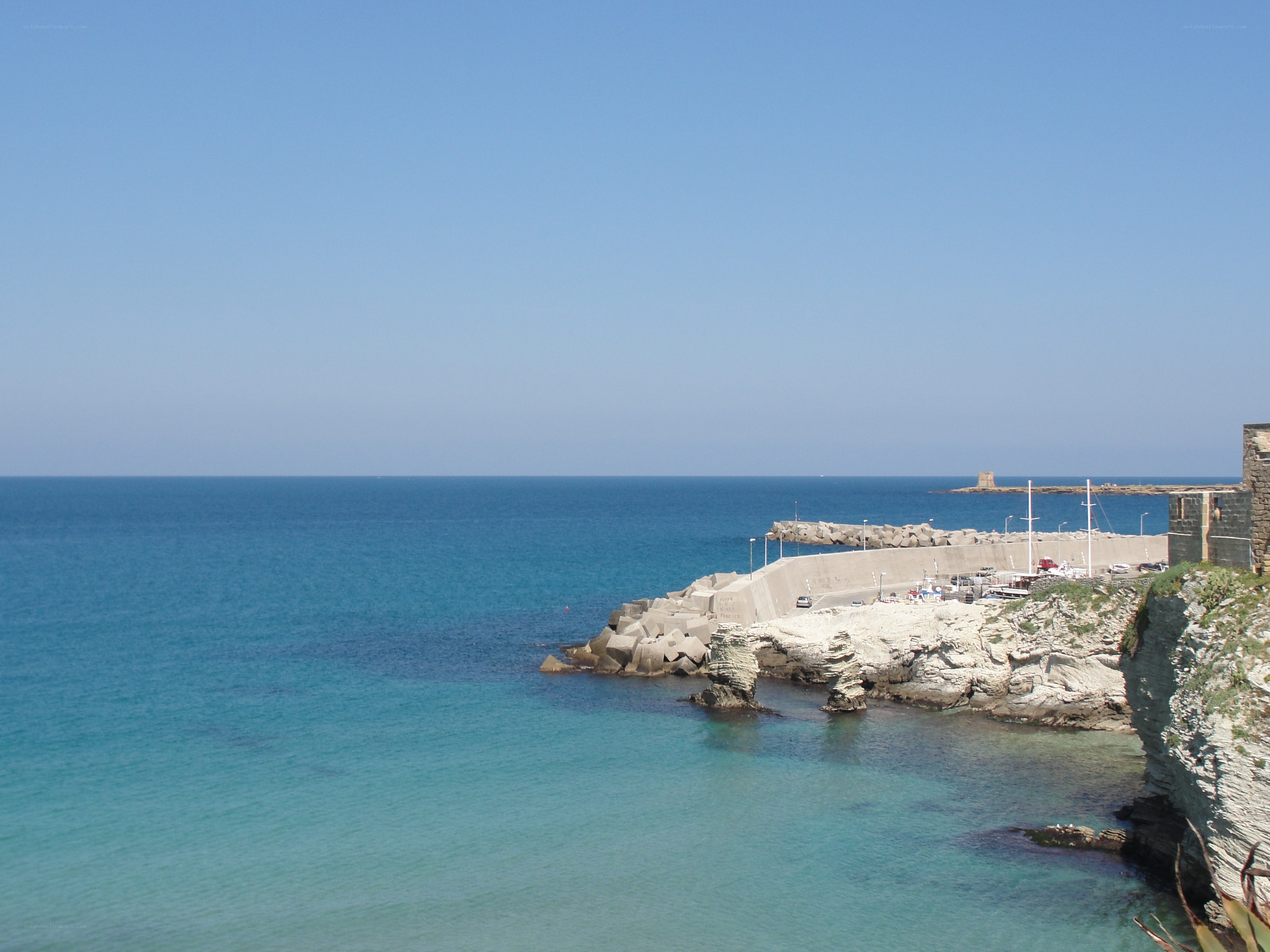 coastal harbor with breakwaters