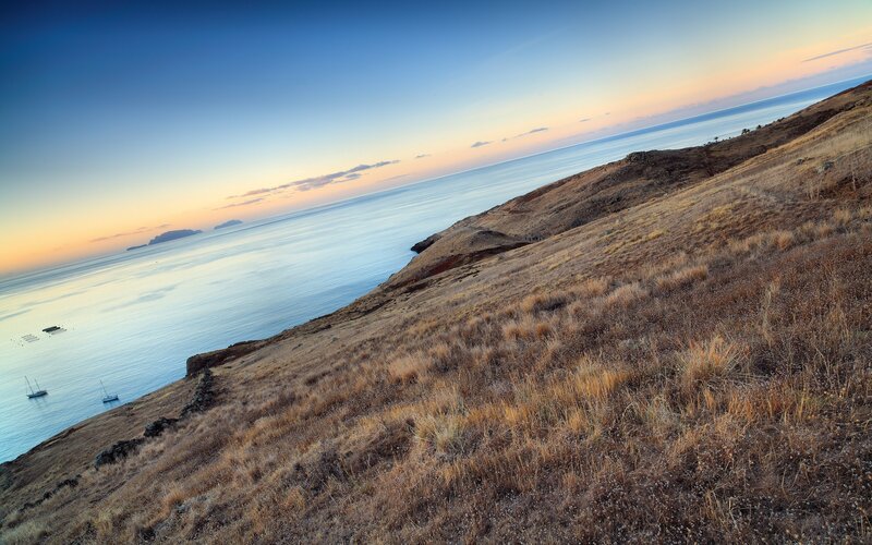 Coastal hill at sunset