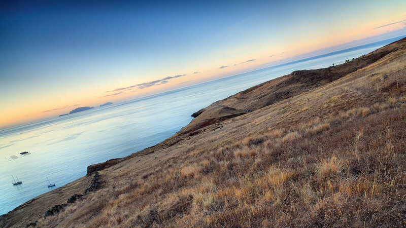 coastal hill at sunset