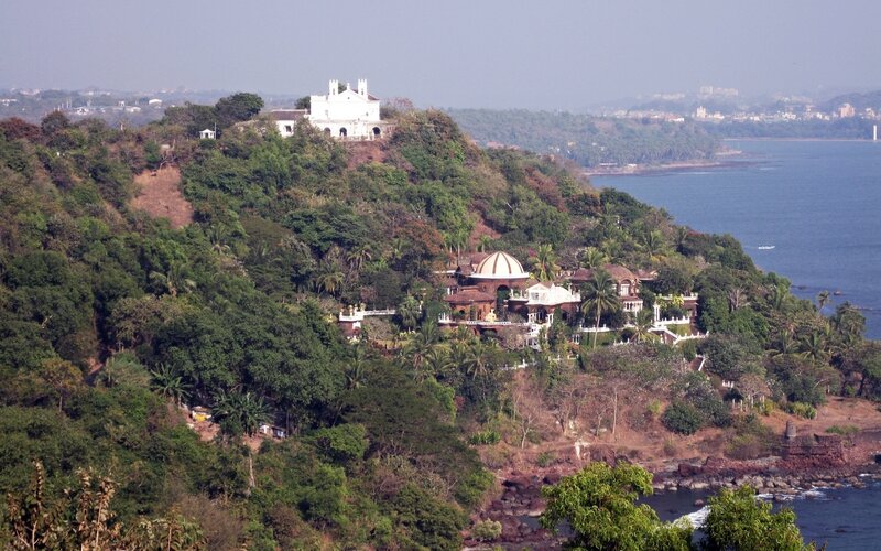 coastal hillside with white buildings