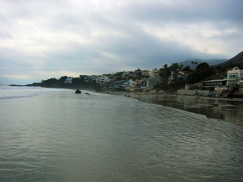 coastal homes under cloudy sky