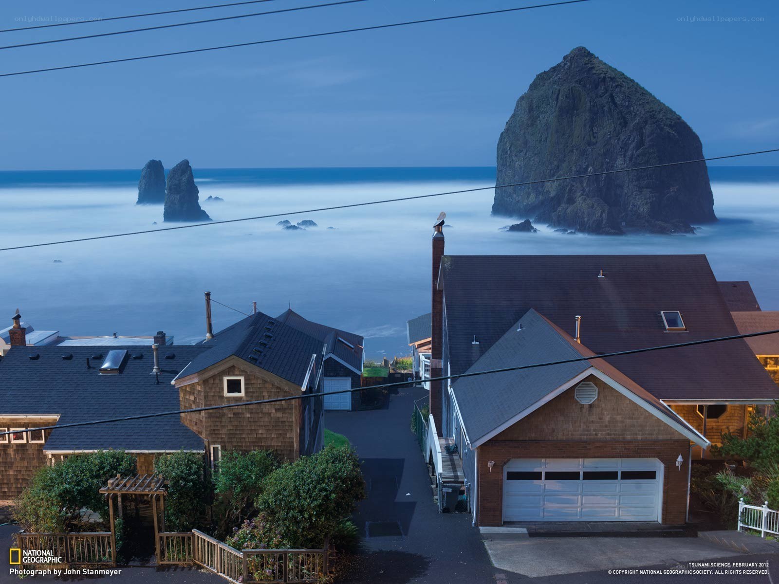 Coastal homes with sea stacks