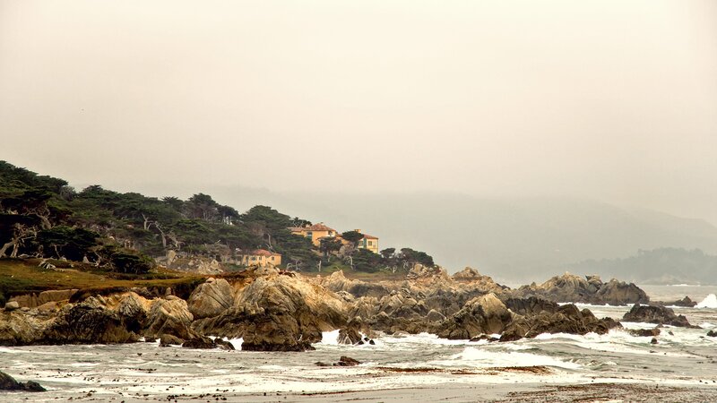 coastal house on rocky shore