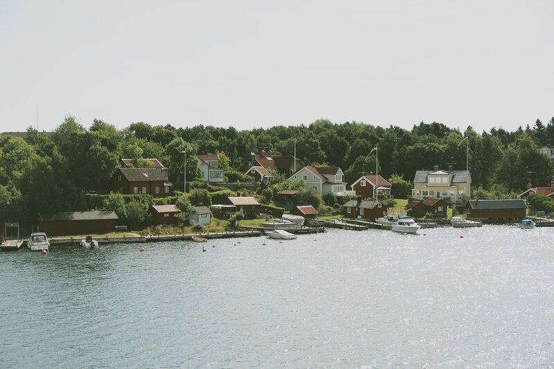 Coastal Houses on Hillside — Blue