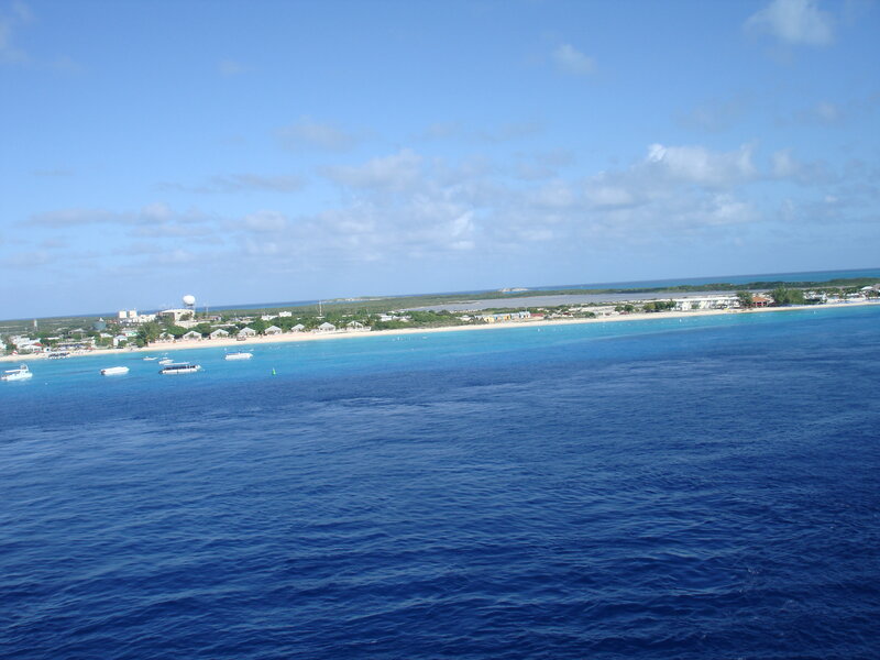 Coastal Island with Boats — Blue
