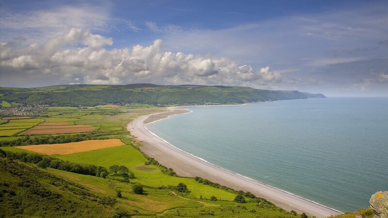 coastal landscape with beach and fields