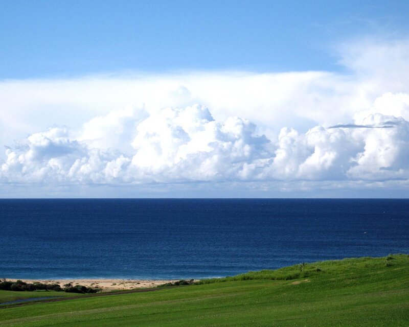 Coastal landscape with clouds