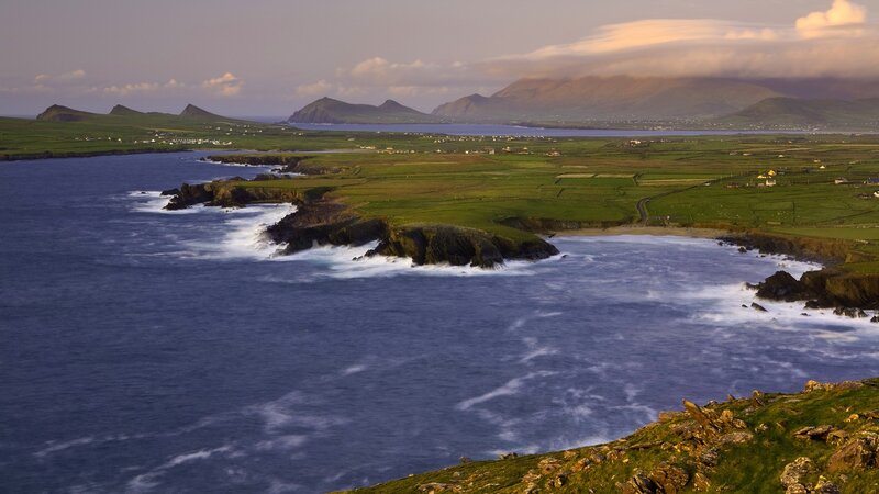 coastal landscape with green fields