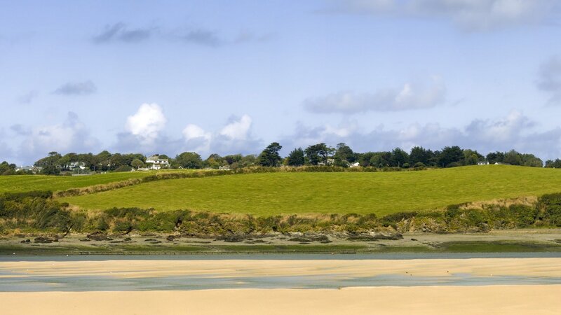 coastal landscape with green hills