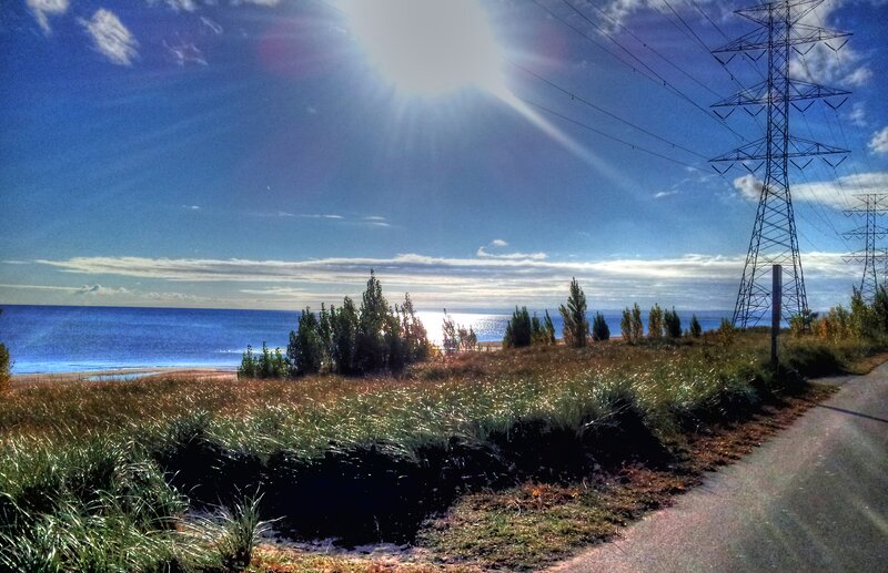 Coastal Landscape with Power Lines