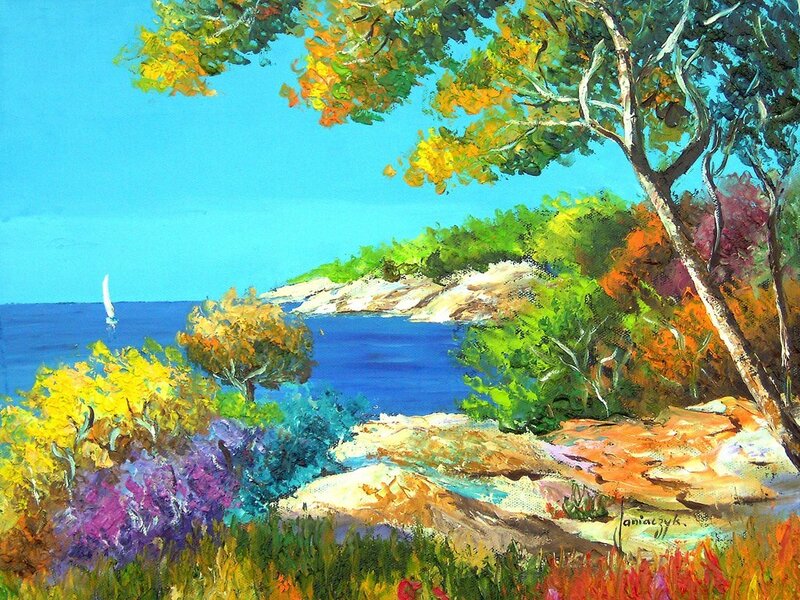 Coastal landscape with sailboat